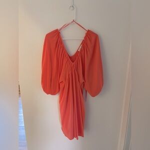 Orange flowy midi dress